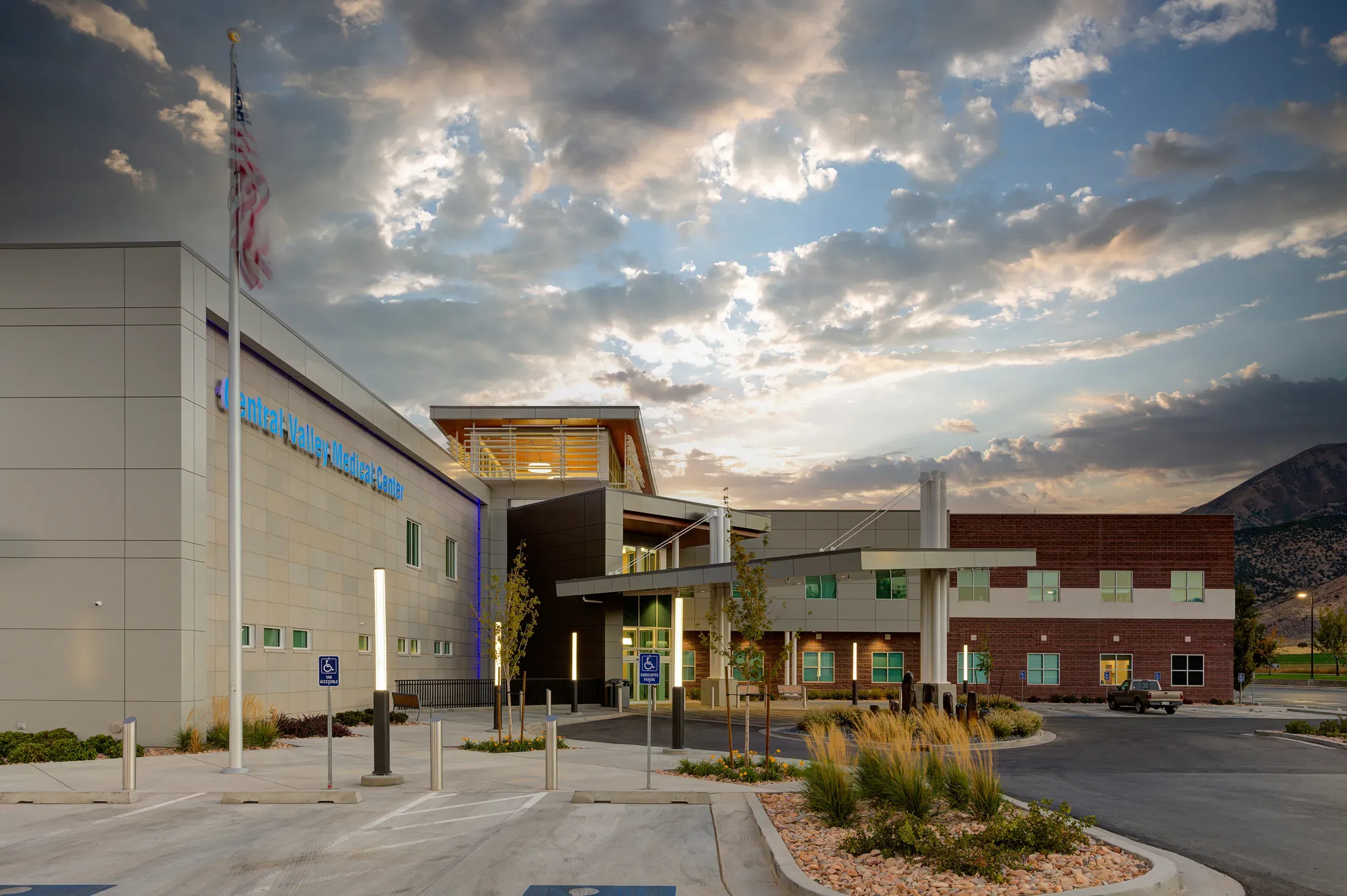 Central Valley Medical Center entrance and flagpole under an evening sky