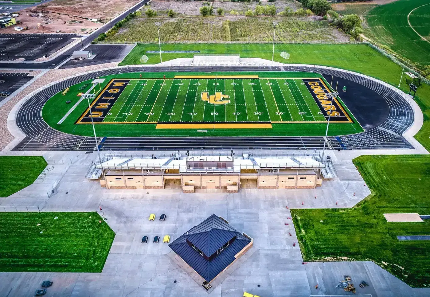 Aerial view of the football stadium, running track and grandstand.