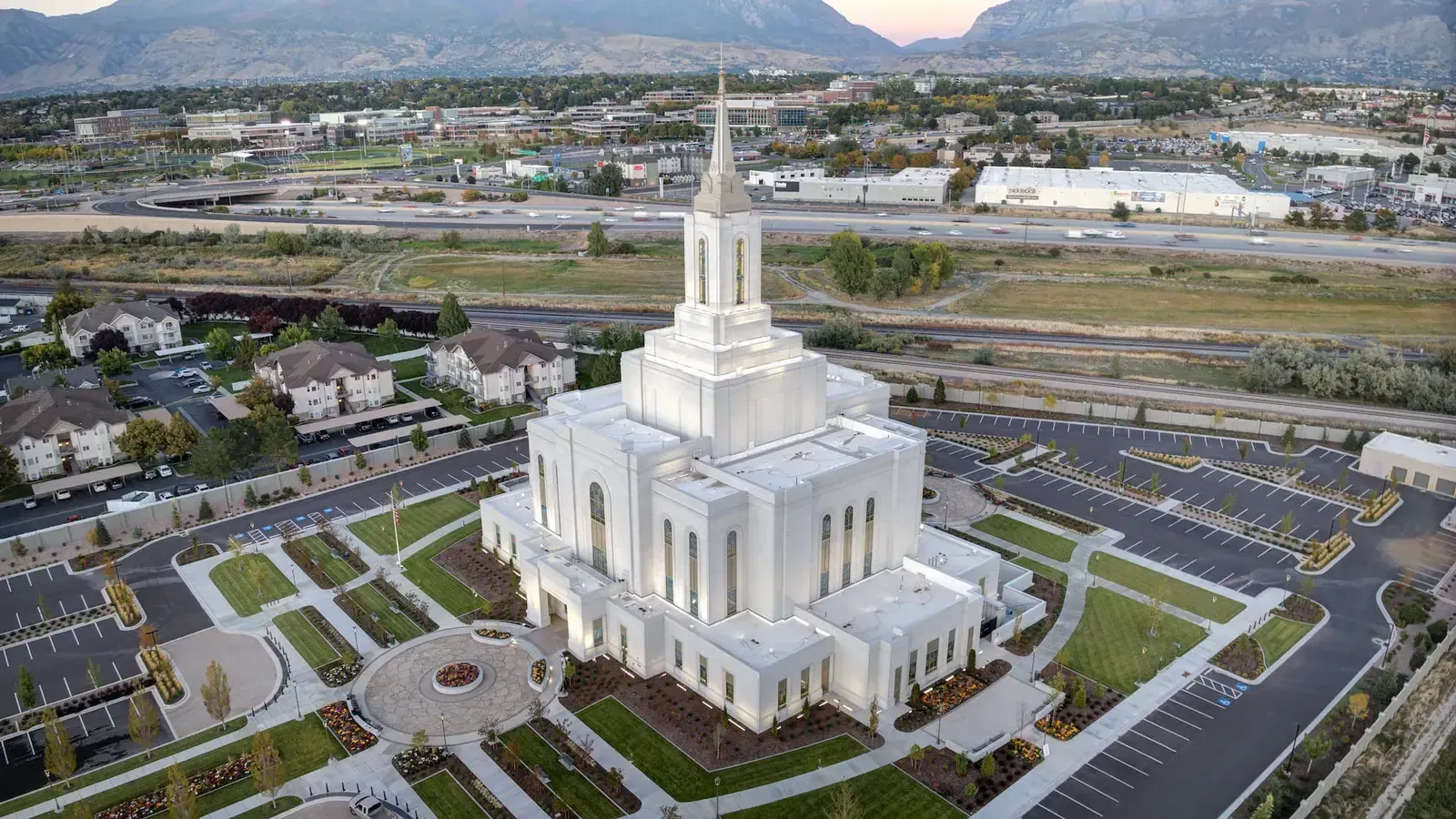 High-angle aerial view of the temple, its parking lots, and the surrounding roads.